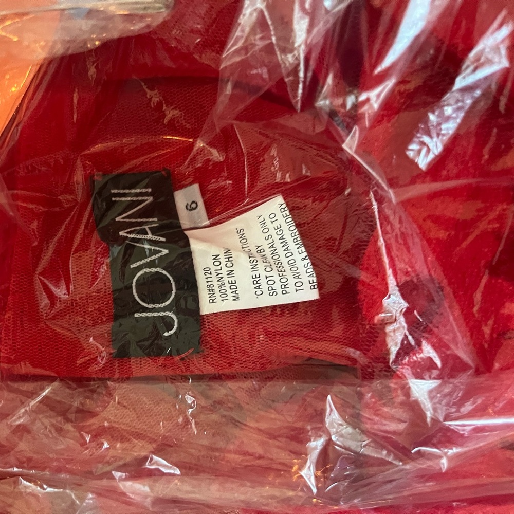 Jovani formal dress. Worn once and dry cleaned. No alterations nor flaws.